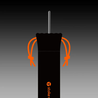 Stoke Voltaics kettle pot in black bag with orange drawstrings, minimalist gradient background